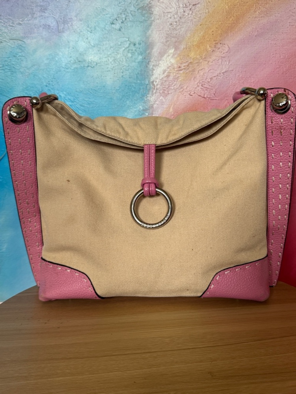 BCBGMazAzria satchel bag canvas with leather trim Silvertone hardware.